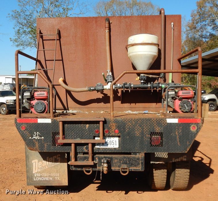 image for item DI8575 2002 Ford F750 Super Duty XL  flatbed truck