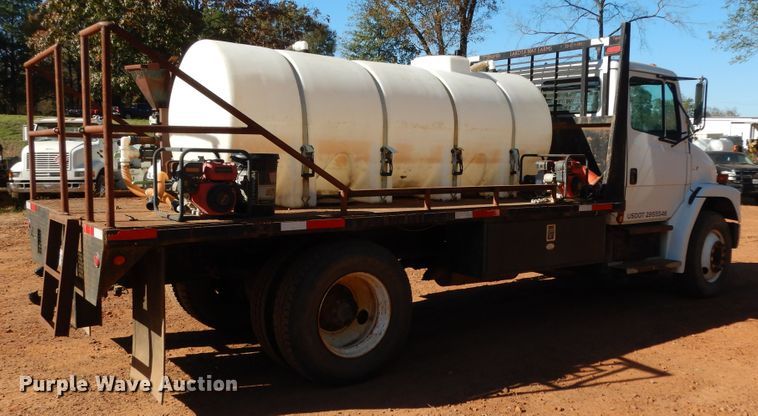 image for item DI8577 2004 Freightliner FL70  flatbed truck