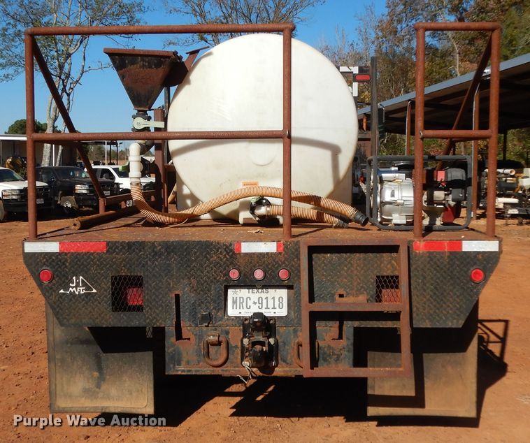 image for item DI8577 2004 Freightliner FL70  flatbed truck