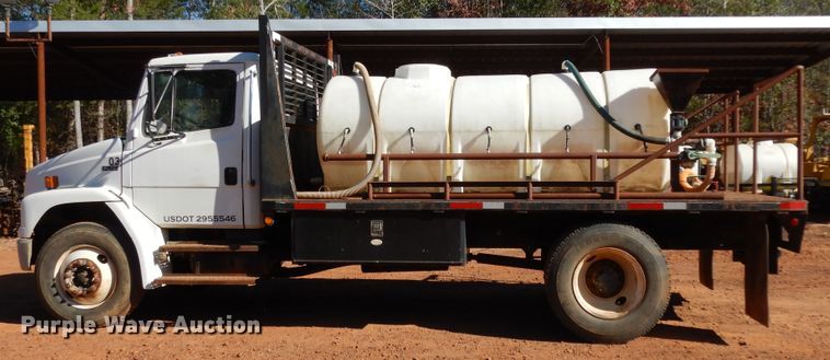 image for item DI8577 2004 Freightliner FL70  flatbed truck