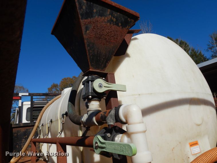 image for item DI8577 2004 Freightliner FL70  flatbed truck