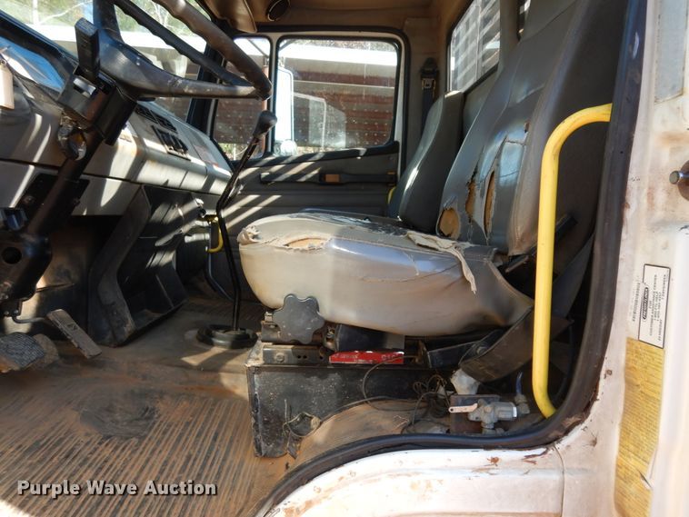 image for item DI8577 2004 Freightliner FL70  flatbed truck