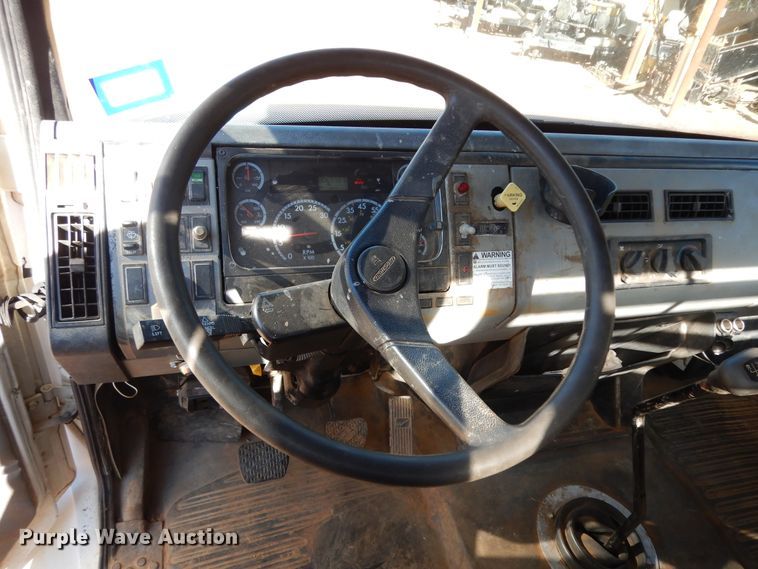 image for item DI8577 2004 Freightliner FL70  flatbed truck