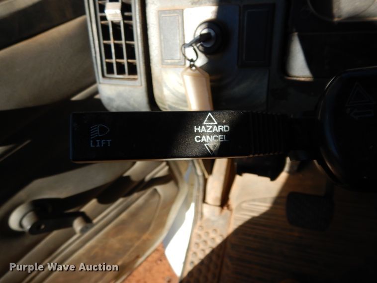 image for item DI8577 2004 Freightliner FL70  flatbed truck