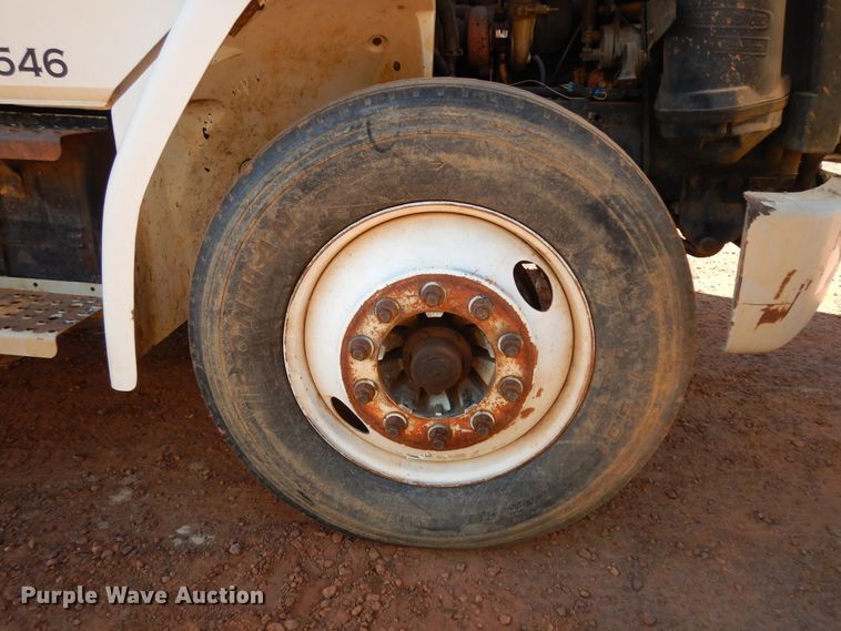 image for item DI8577 2004 Freightliner FL70  flatbed truck