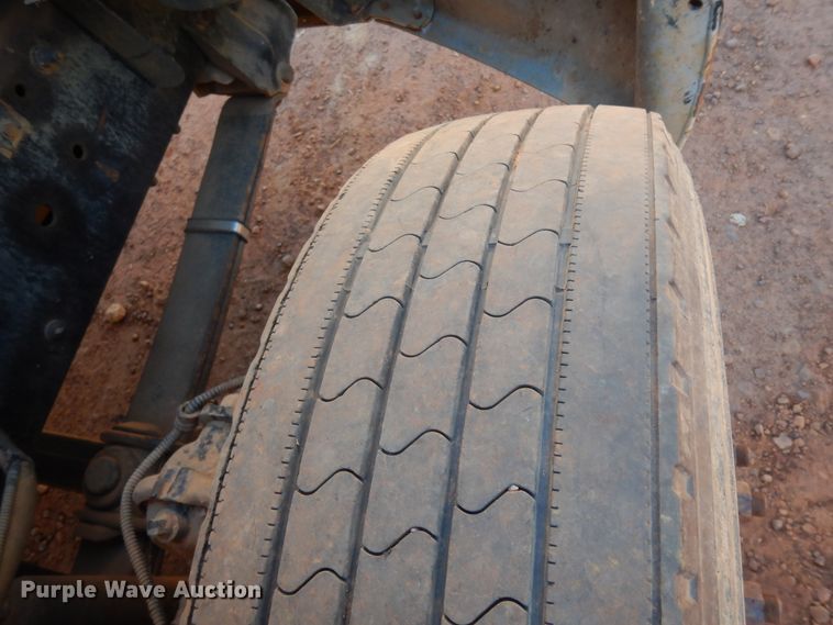 image for item DI8577 2004 Freightliner FL70  flatbed truck