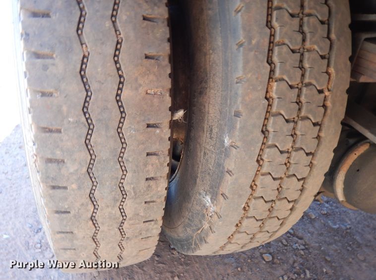 image for item DI8577 2004 Freightliner FL70  flatbed truck