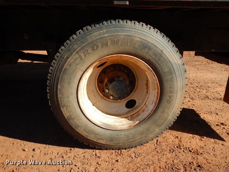 image for item DI8577 2004 Freightliner FL70  flatbed truck