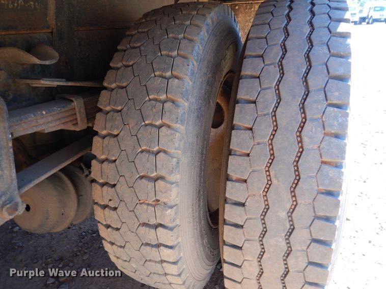 image for item DI8577 2004 Freightliner FL70  flatbed truck