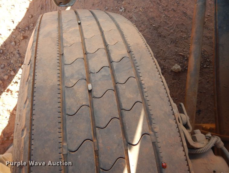 image for item DI8577 2004 Freightliner FL70  flatbed truck