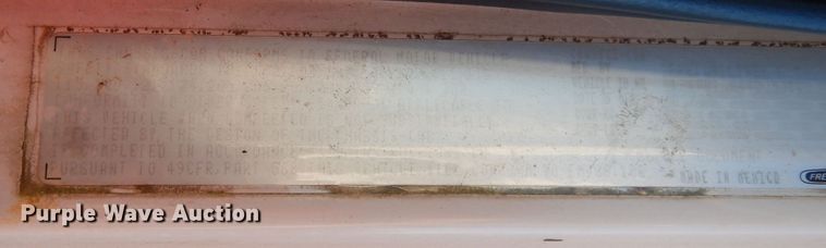 image for item DI8577 2004 Freightliner FL70  flatbed truck