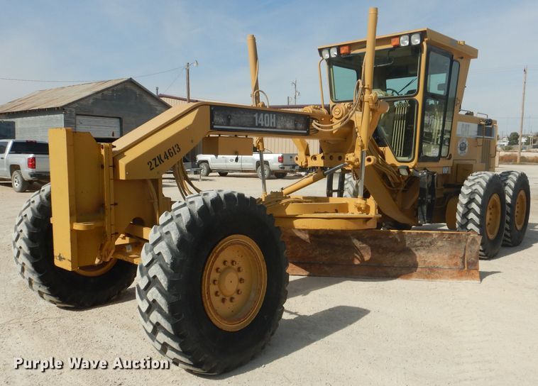 image for item DJ8888 1999 Caterpillar 140H  motor grader