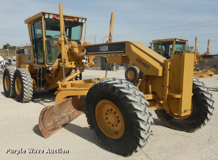 image for item DJ8888 1999 Caterpillar 140H  motor grader