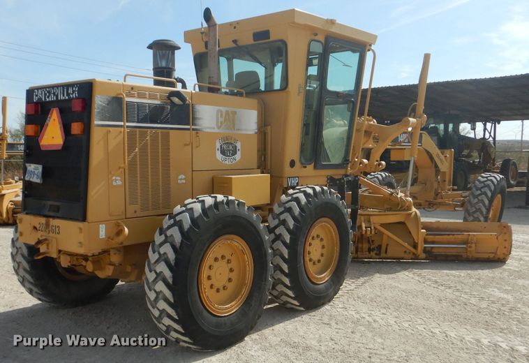 image for item DJ8888 1999 Caterpillar 140H  motor grader