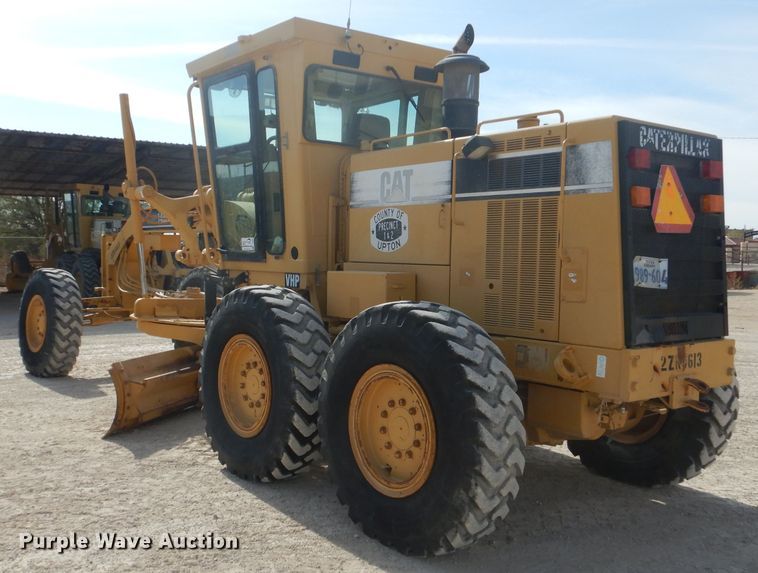 image for item DJ8888 1999 Caterpillar 140H  motor grader