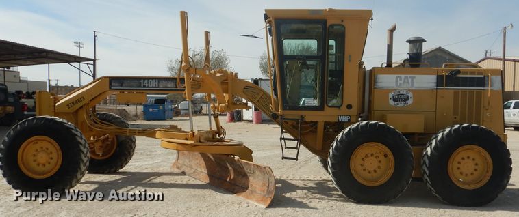 image for item DJ8888 1999 Caterpillar 140H  motor grader