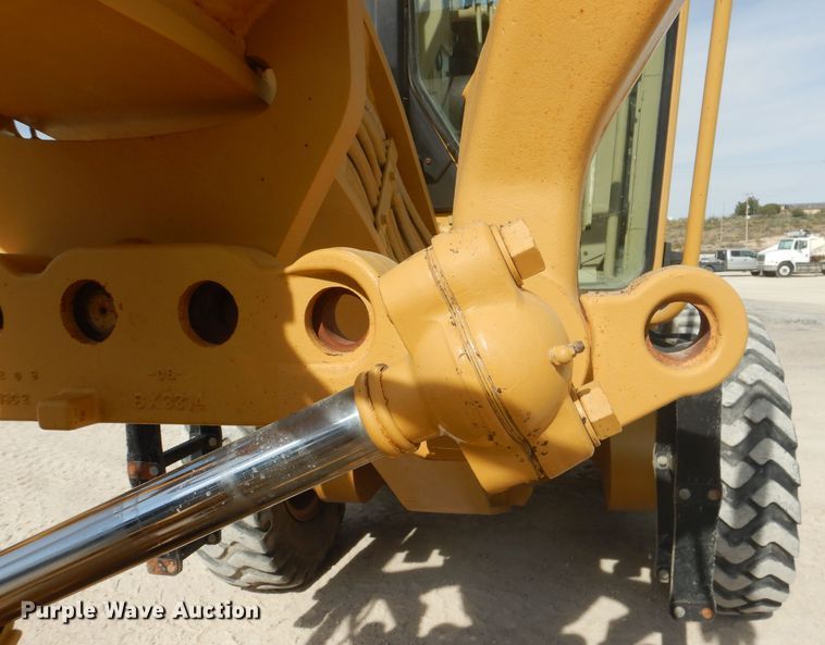 image for item DJ8888 1999 Caterpillar 140H  motor grader