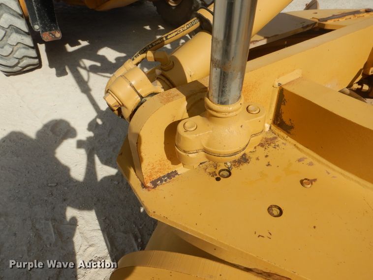 image for item DJ8888 1999 Caterpillar 140H  motor grader