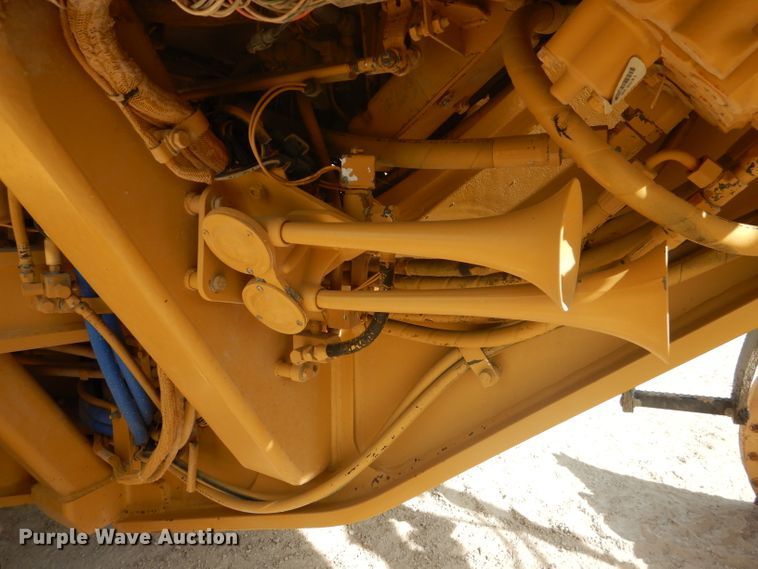 image for item DJ8888 1999 Caterpillar 140H  motor grader