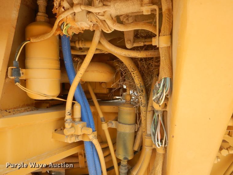 image for item DJ8888 1999 Caterpillar 140H  motor grader