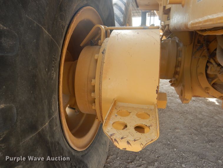 image for item DJ8888 1999 Caterpillar 140H  motor grader