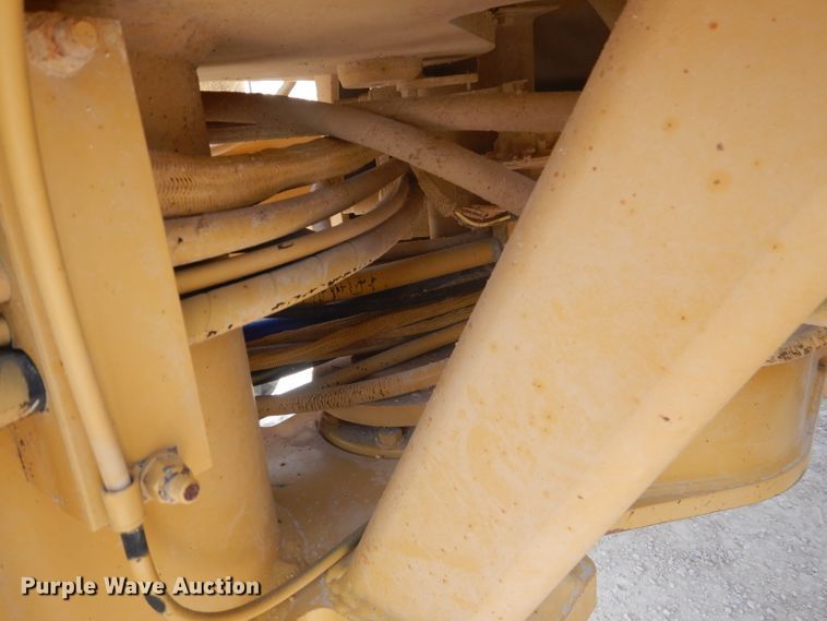 image for item DJ8888 1999 Caterpillar 140H  motor grader