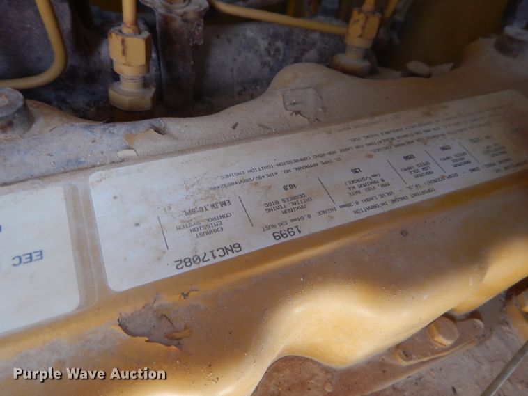 image for item DJ8888 1999 Caterpillar 140H  motor grader