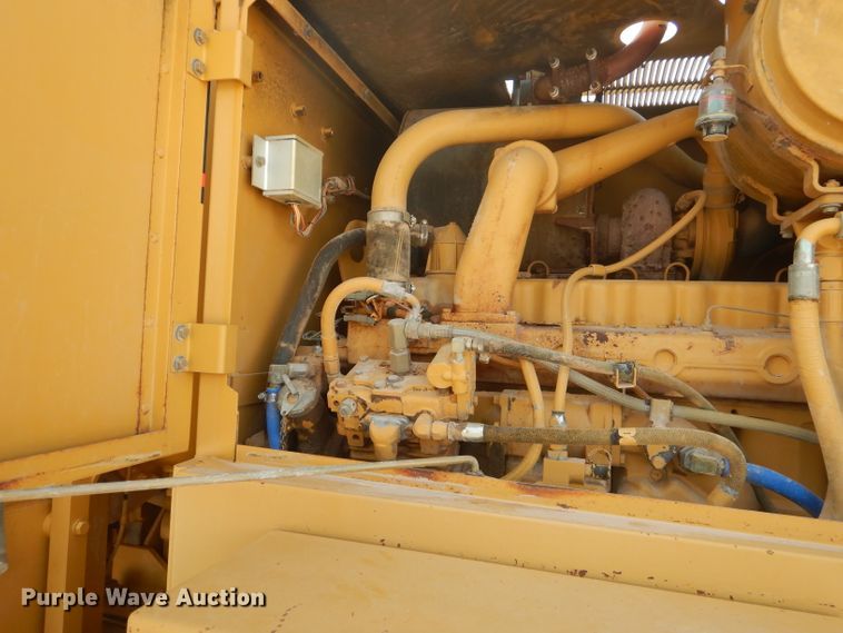 image for item DJ8888 1999 Caterpillar 140H  motor grader