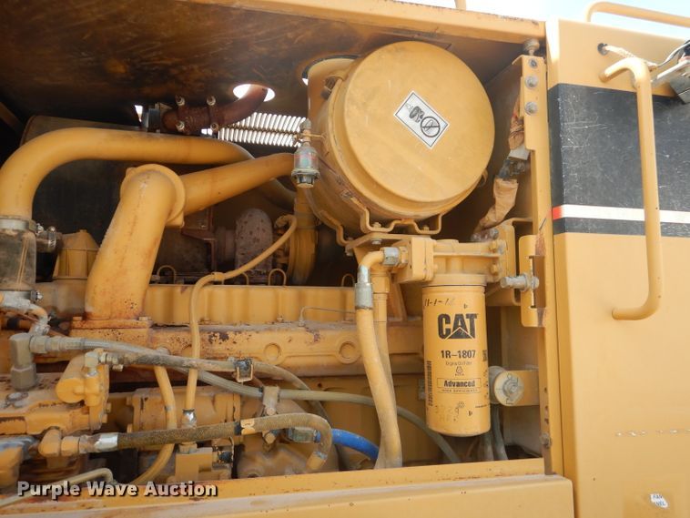 image for item DJ8888 1999 Caterpillar 140H  motor grader