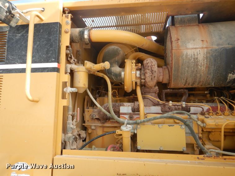 image for item DJ8888 1999 Caterpillar 140H  motor grader