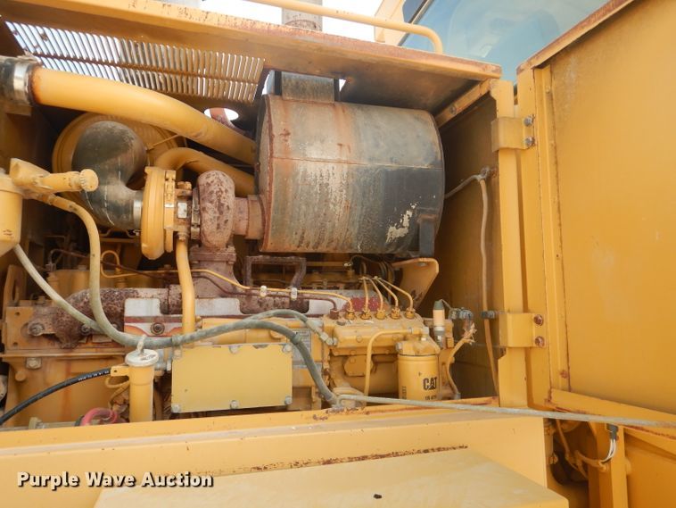 image for item DJ8888 1999 Caterpillar 140H  motor grader