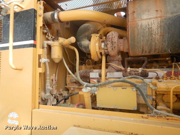 image for item DJ8888 1999 Caterpillar 140H  motor grader