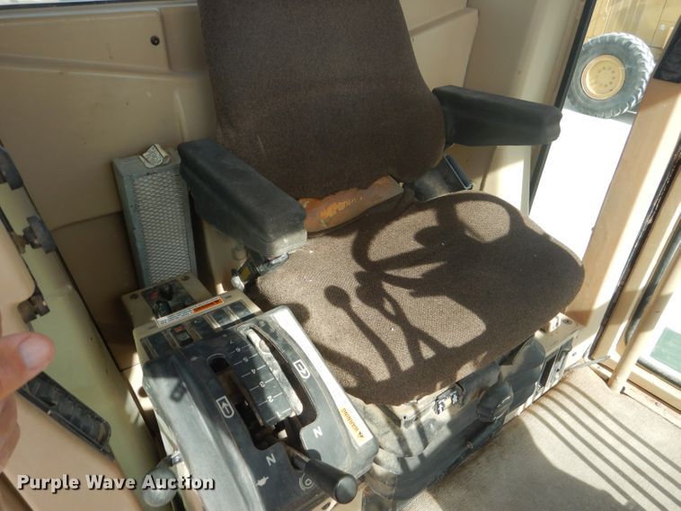 image for item DJ8888 1999 Caterpillar 140H  motor grader