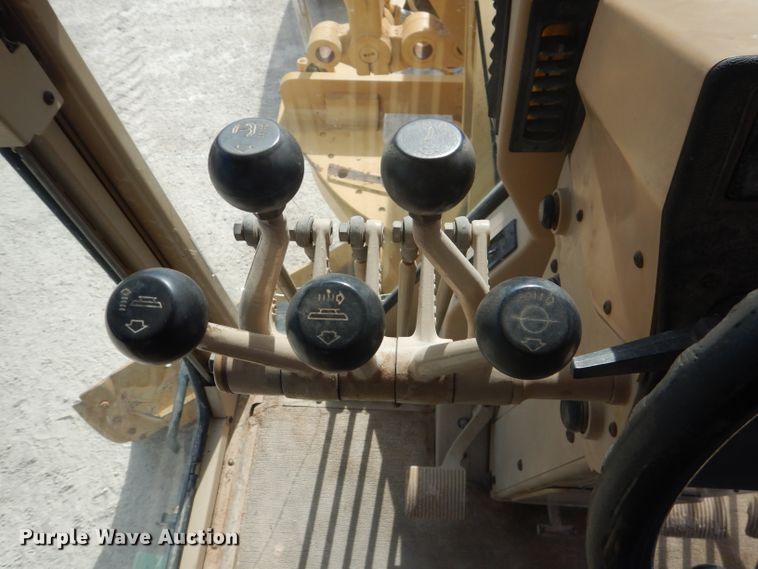 image for item DJ8888 1999 Caterpillar 140H  motor grader