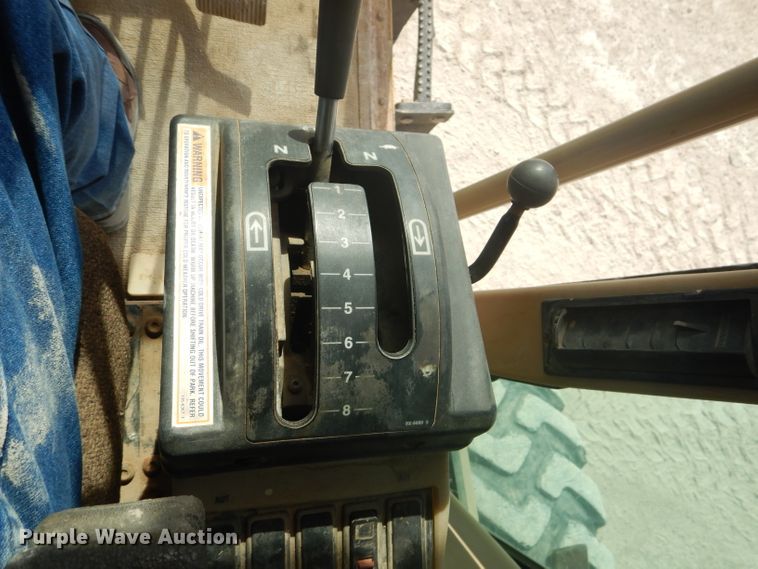 image for item DJ8888 1999 Caterpillar 140H  motor grader