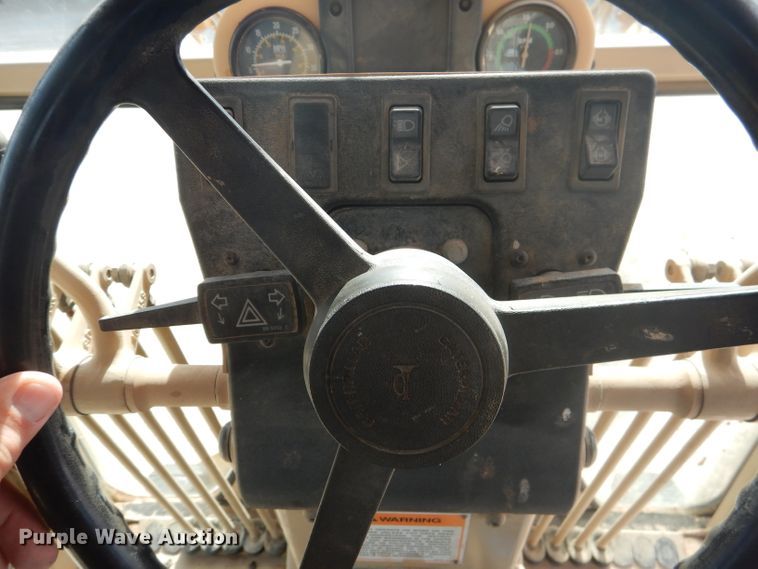 image for item DJ8888 1999 Caterpillar 140H  motor grader