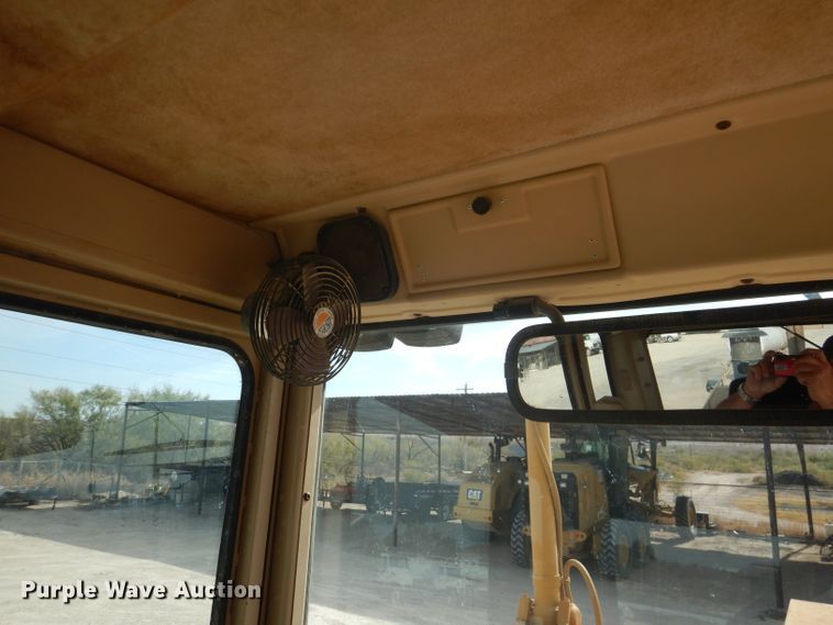 image for item DJ8888 1999 Caterpillar 140H  motor grader