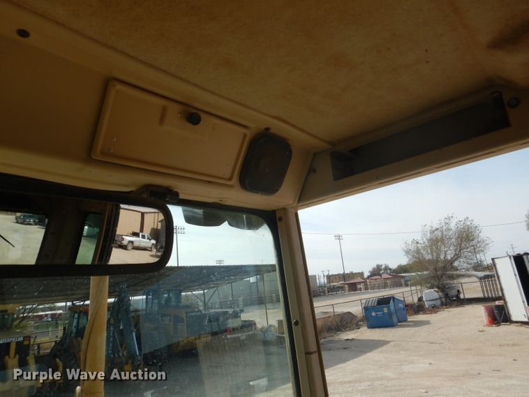 image for item DJ8888 1999 Caterpillar 140H  motor grader