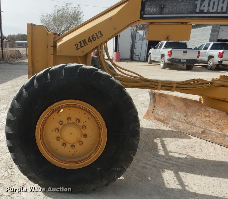 image for item DJ8888 1999 Caterpillar 140H  motor grader