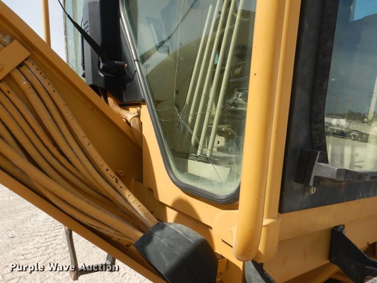 image for item DJ8888 1999 Caterpillar 140H  motor grader