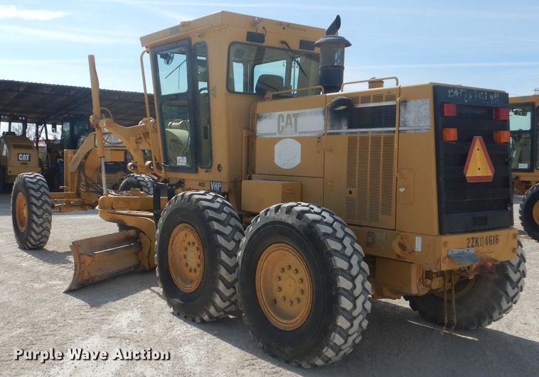 image for item DJ8889 1999 Caterpillar 140H  motor grader