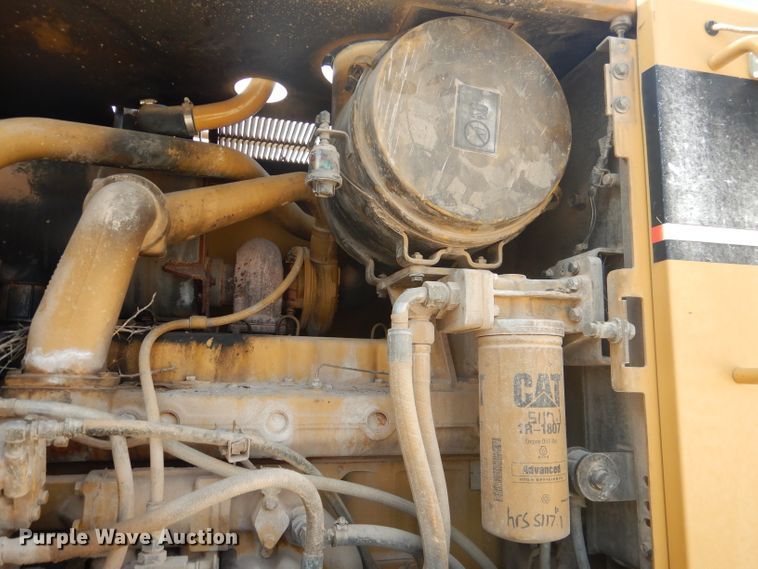 image for item DJ8889 1999 Caterpillar 140H  motor grader