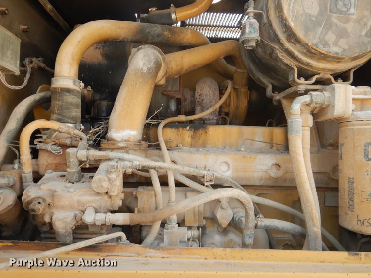 image for item DJ8889 1999 Caterpillar 140H  motor grader