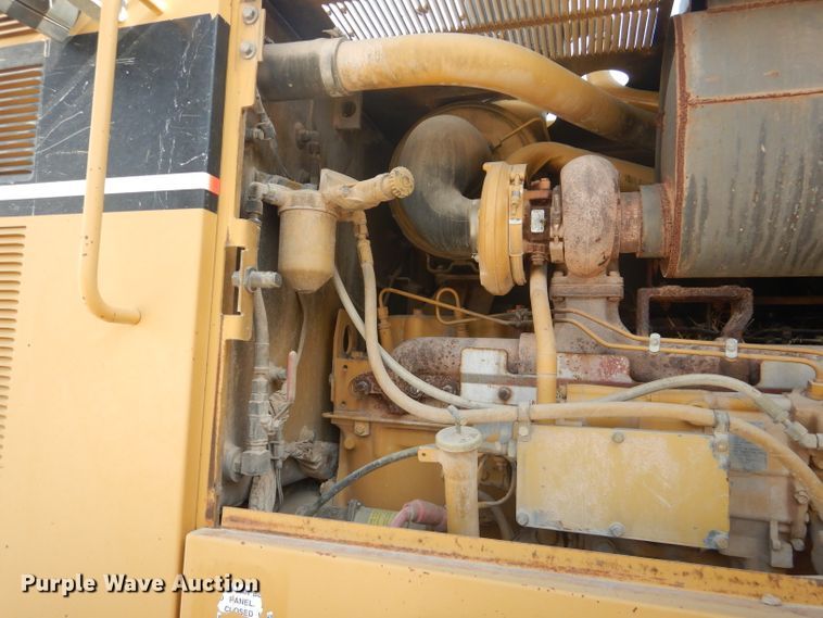 image for item DJ8889 1999 Caterpillar 140H  motor grader