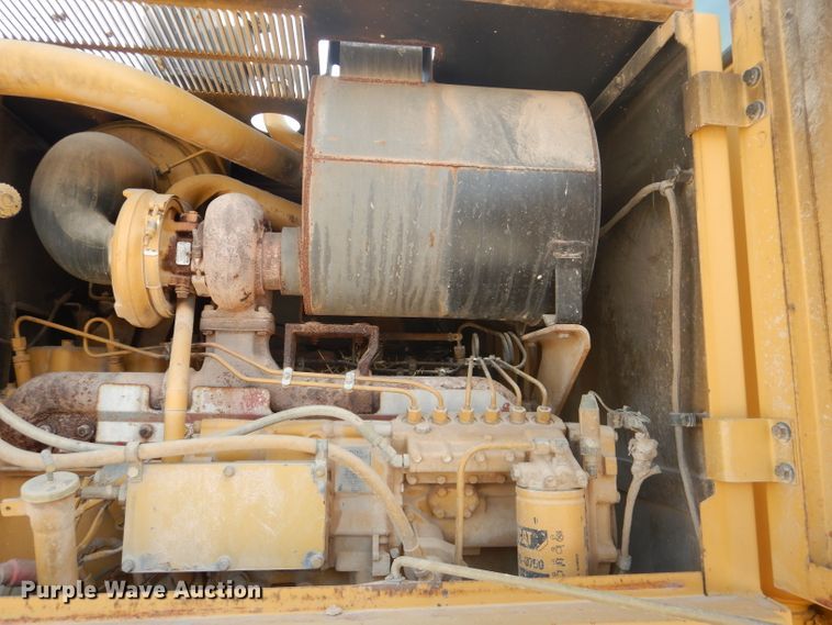 image for item DJ8889 1999 Caterpillar 140H  motor grader