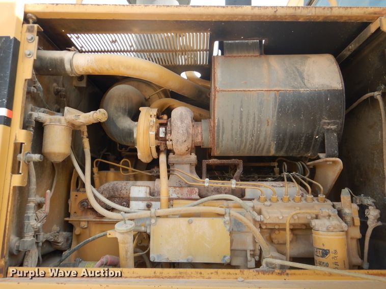 image for item DJ8889 1999 Caterpillar 140H  motor grader