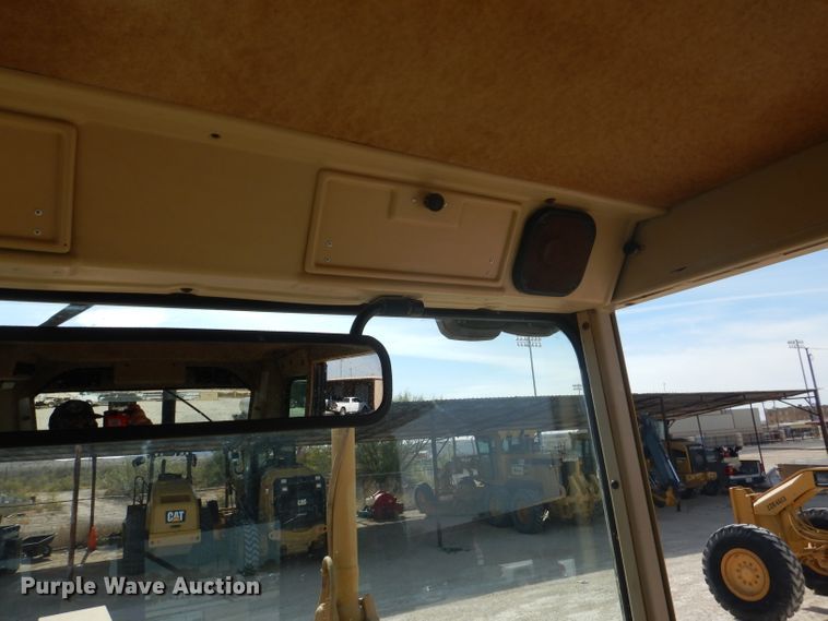 image for item DJ8889 1999 Caterpillar 140H  motor grader