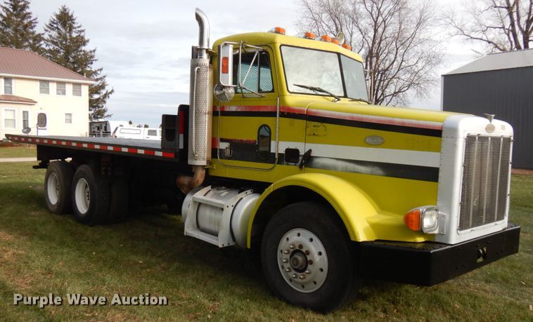 image for item IO9553 1997 Peterbilt 378  rollback truck