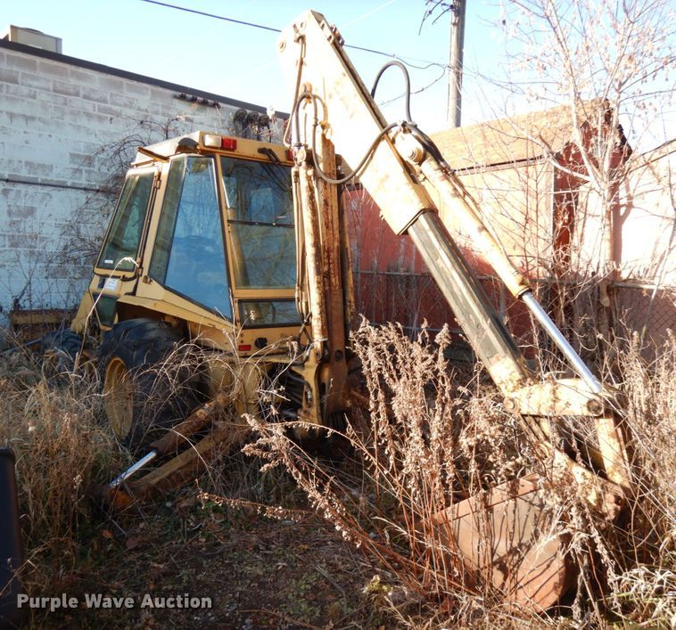 image for item IO9587 1986 Caterpillar 416  backhoe