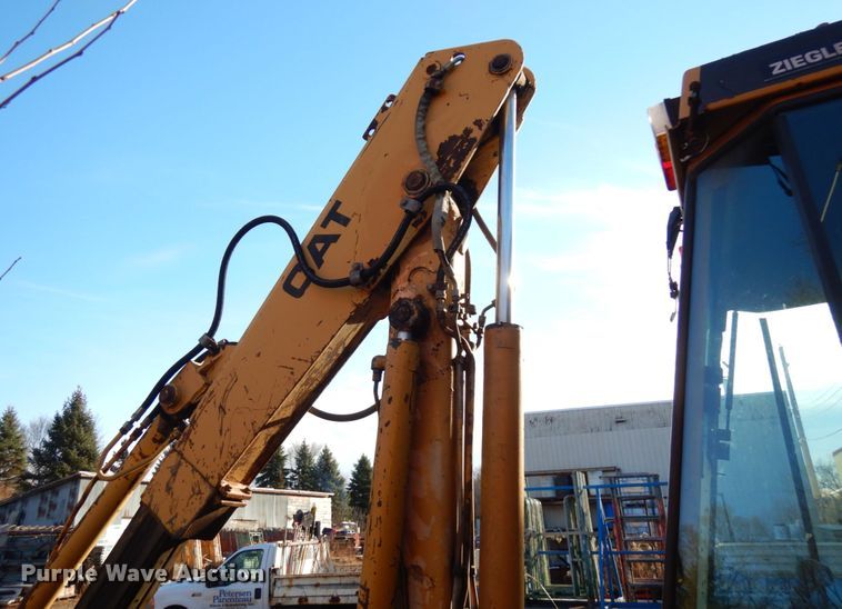image for item IO9587 1986 Caterpillar 416  backhoe